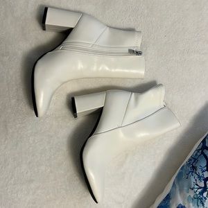 While heeled boots, size 9 perfect condition